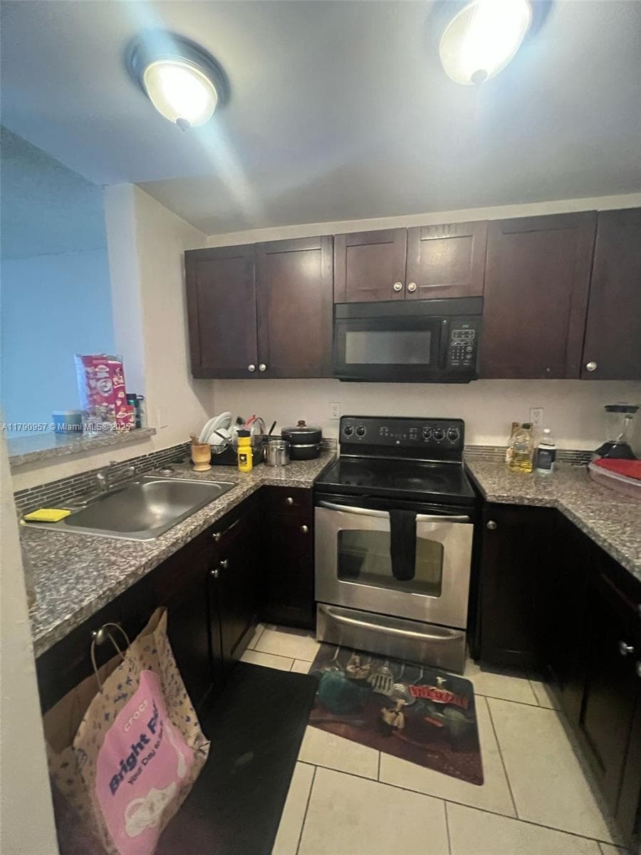 482 NW 165th St Rd # A203, Miami, FL 33169