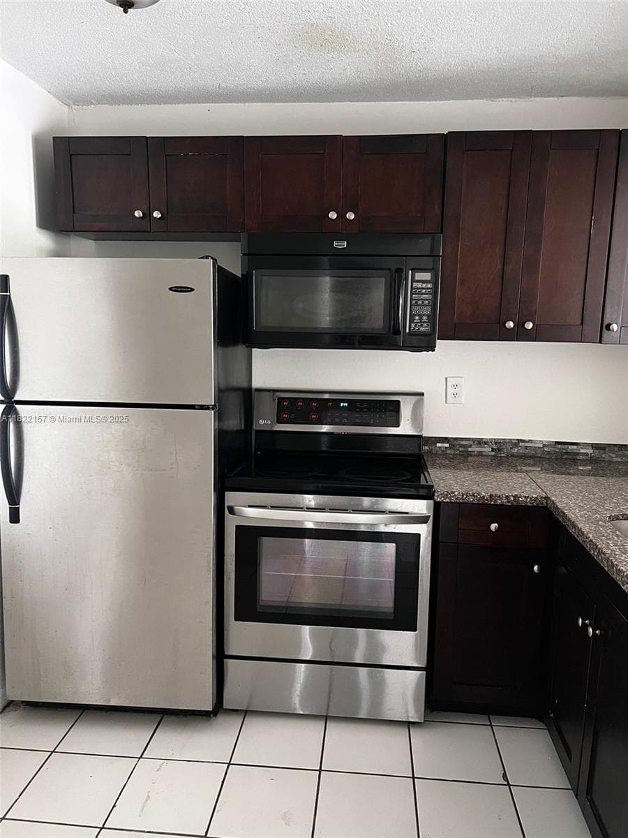 498 NW 165th St Rd # D303, Miami, FL 33169