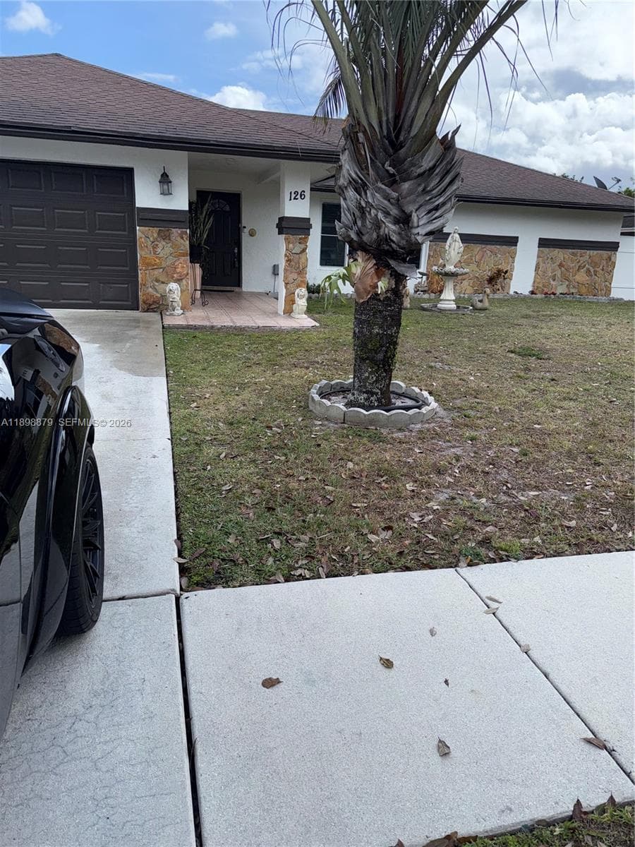 126 Sunflower Cir, Royal Palm Beach, FL 33411