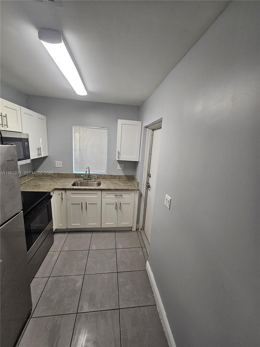 1128 NW 101st St, Miami, FL 33150 — zdjęcie 4
