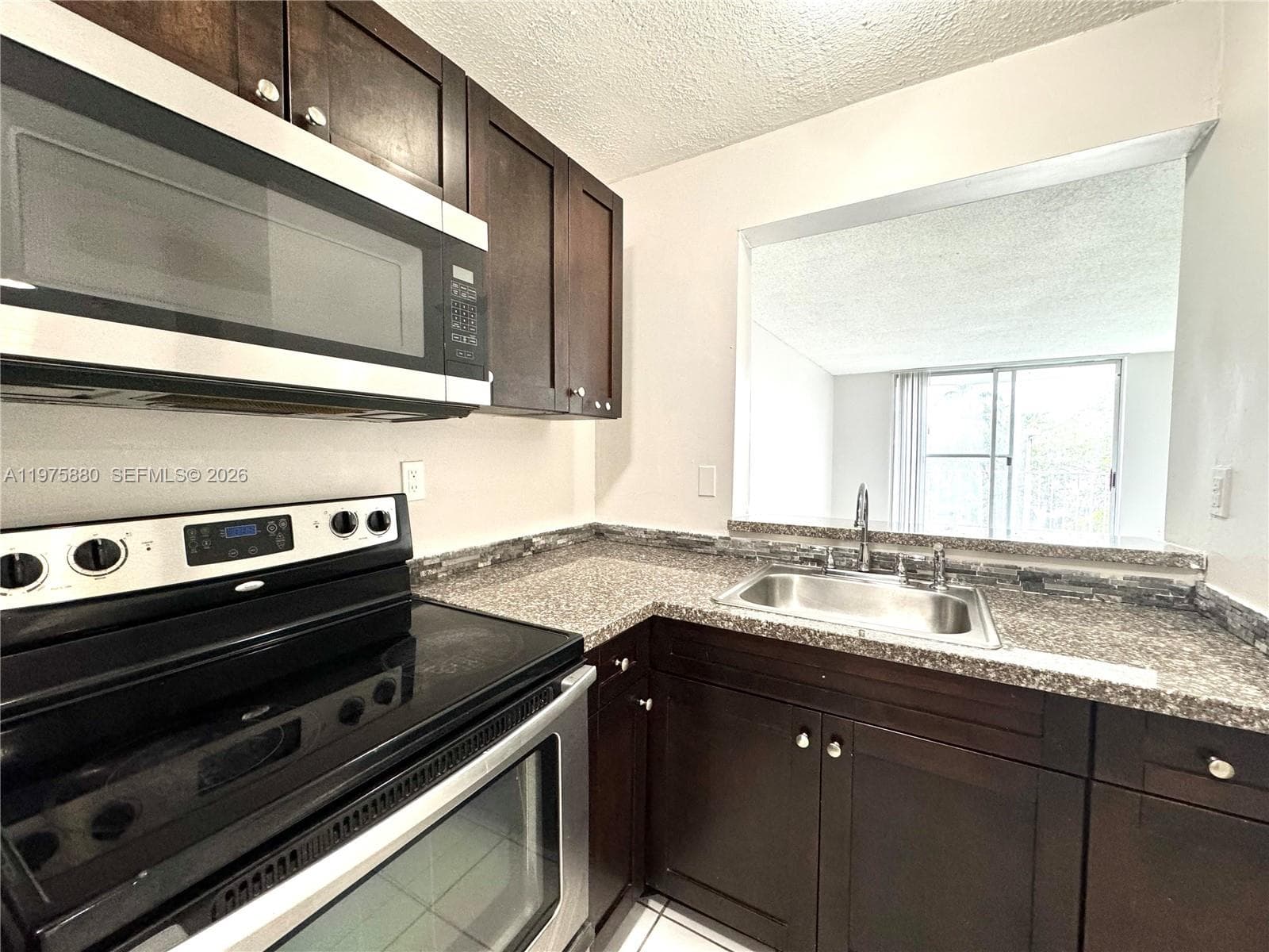484 NW 165th St Rd # A-411, Miami, FL 33169