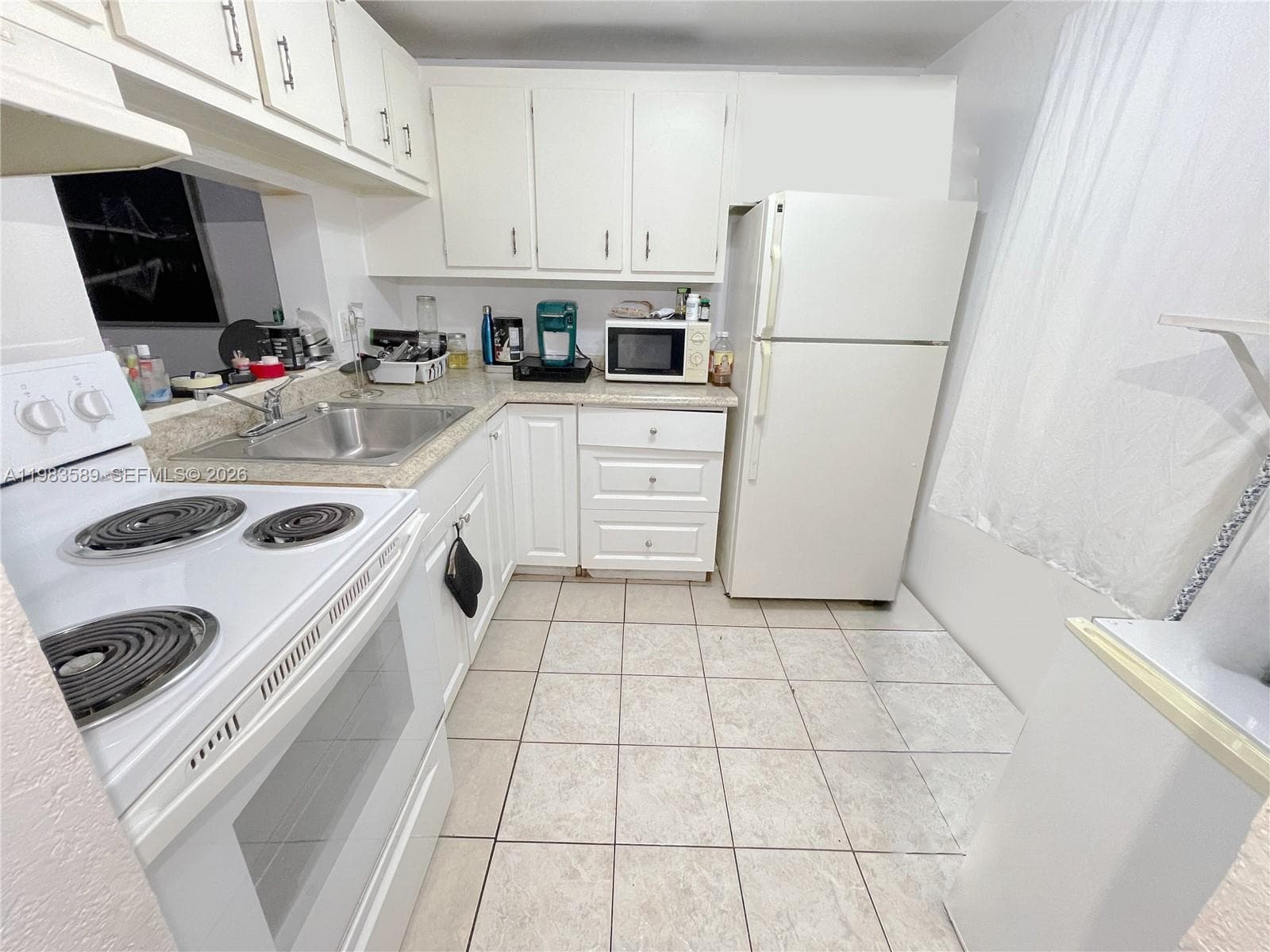 2800 NW 56th Ave # E103, Lauderhill, FL 33313 — zdjęcie 2