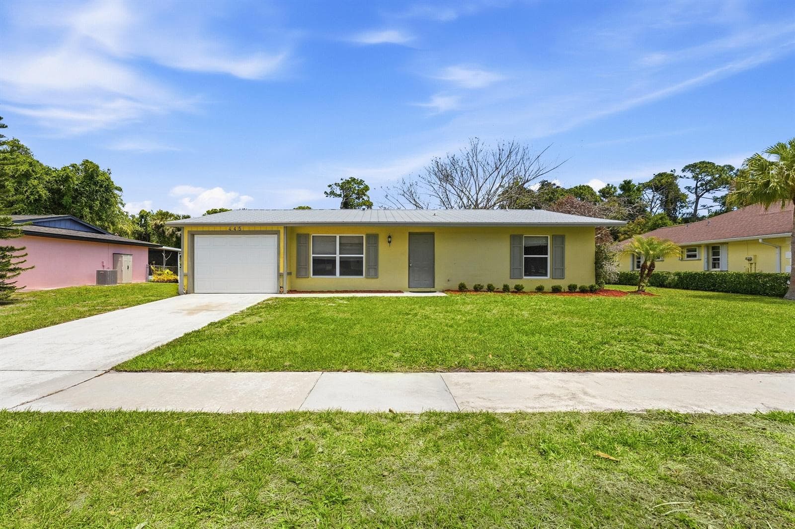 445 NE Armory Circle, Port St. Lucie, FL 34983