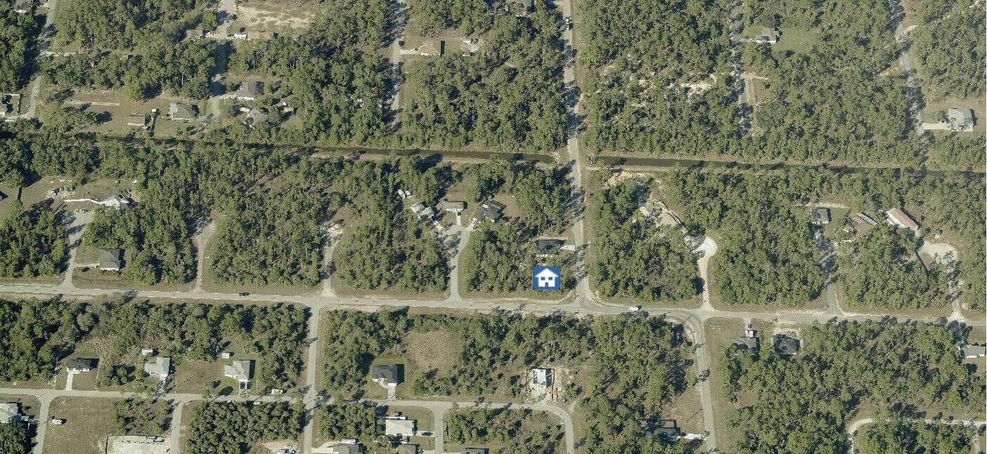 107 Moore Avenue, Lehigh Acres, FL 33936