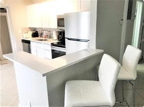 4411 E TRADEWINDS # A-B, Lauderdale By The Sea, FL 33308 — zdjęcie 4