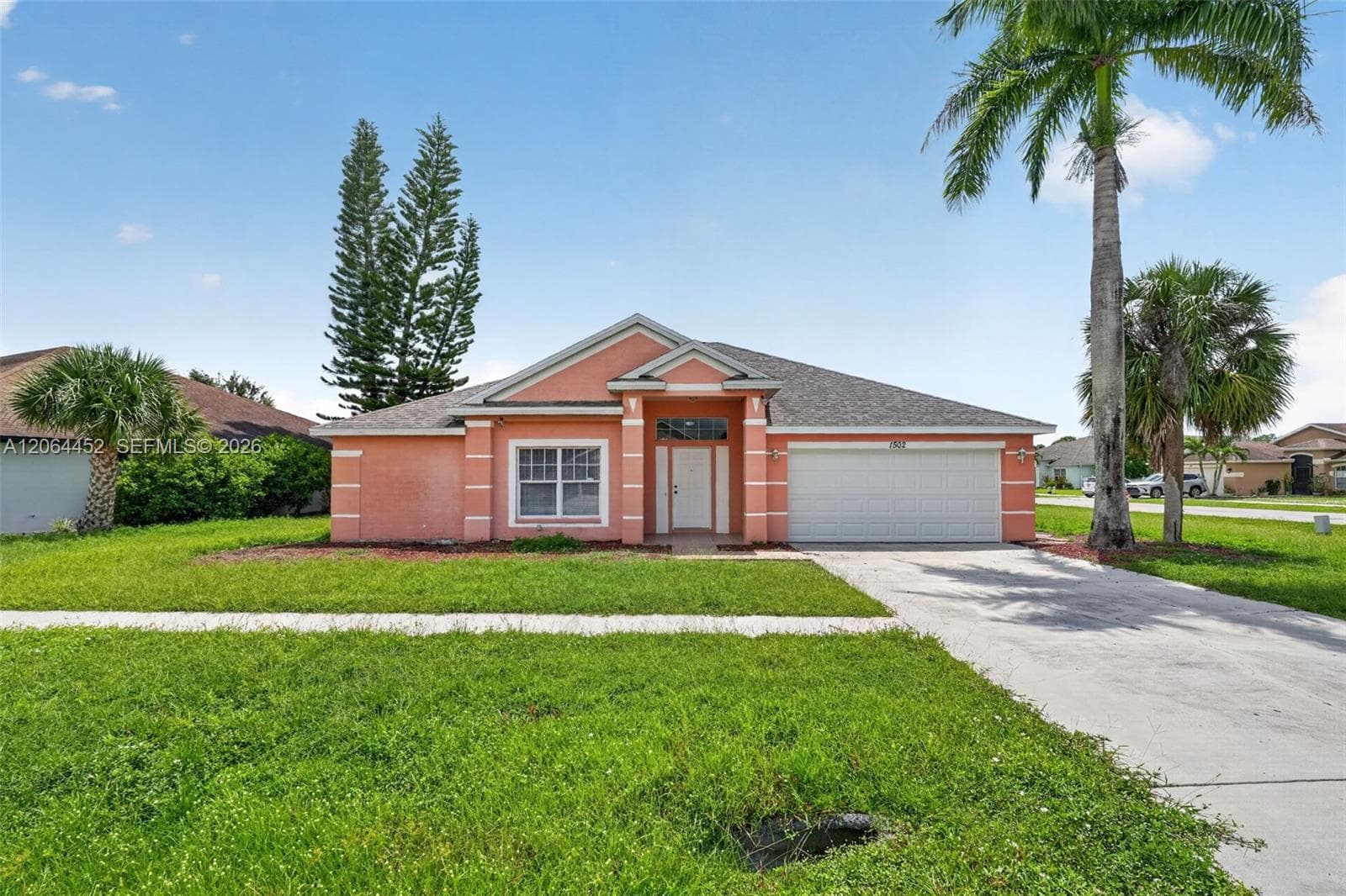 1502 Scholar CT, Lehigh Acres, FL 33971