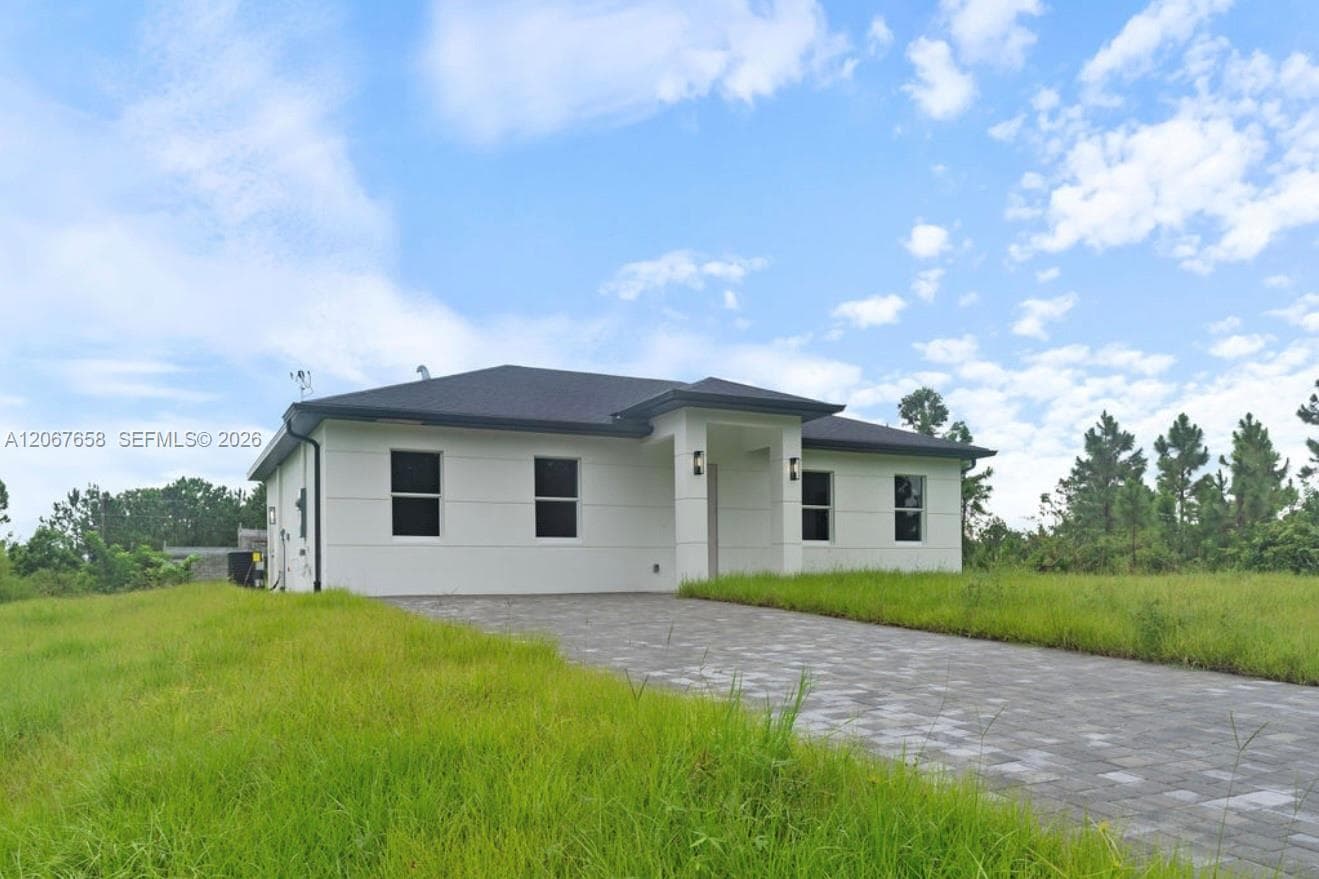 710 Peacock Ave, Lehigh Acres, FL 33974 — zdjęcie 2