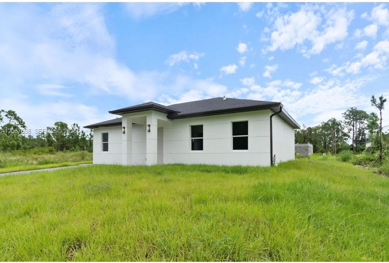 710 Peacock Ave, Lehigh Acres, FL 33974 — zdjęcie 3