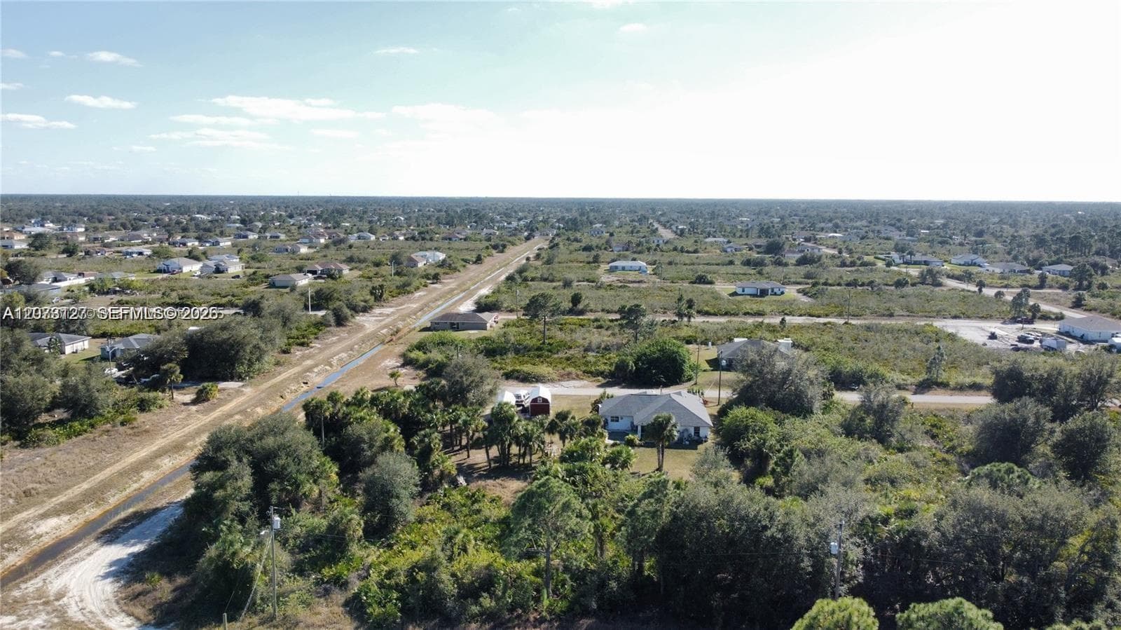 7502 JOAN AVE N, Lehigh Acres, FL 33971 — zdjęcie 5