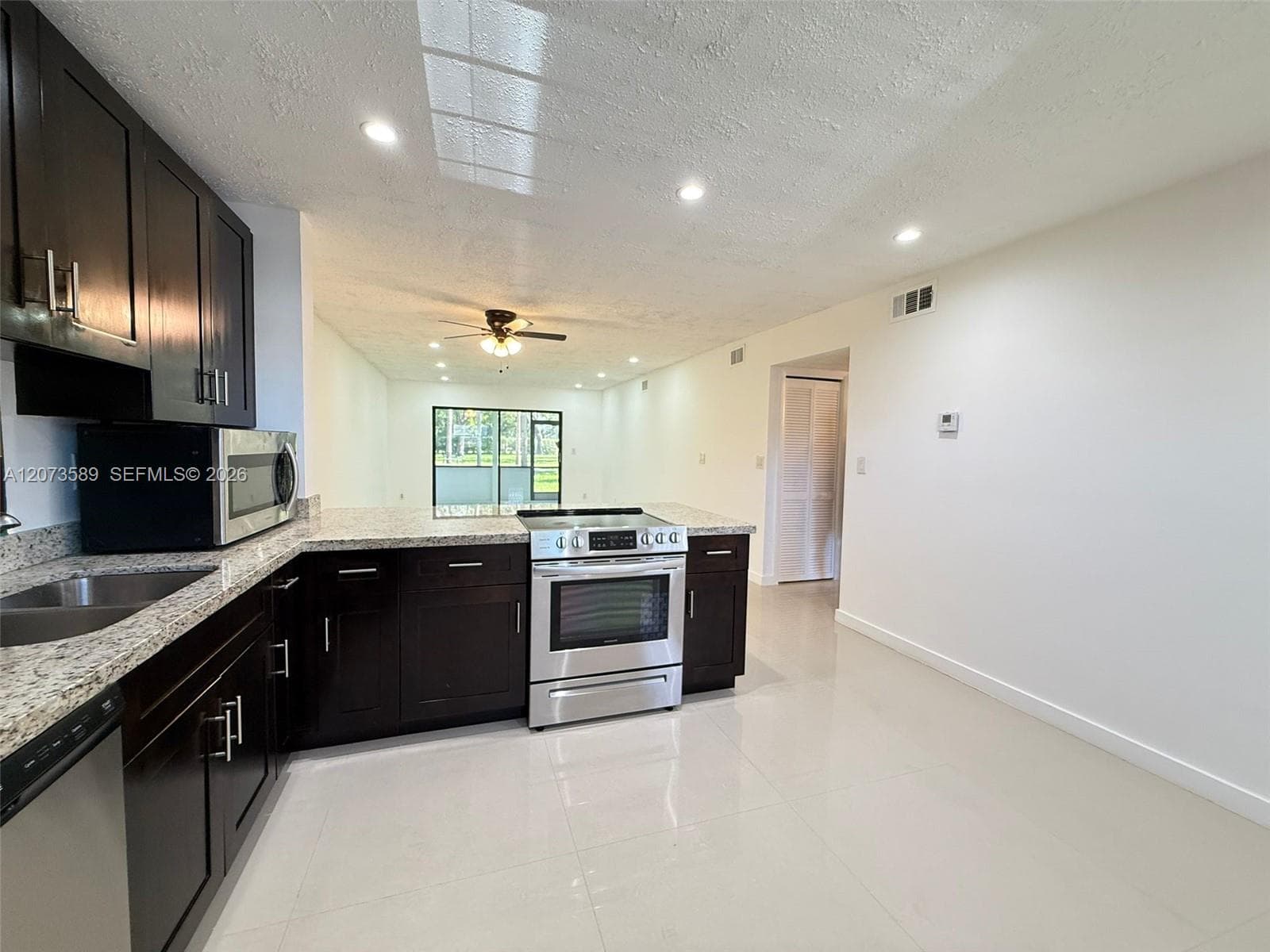 6095 N Sabal Palm Blvd # 103, Tamarac, FL 33319
