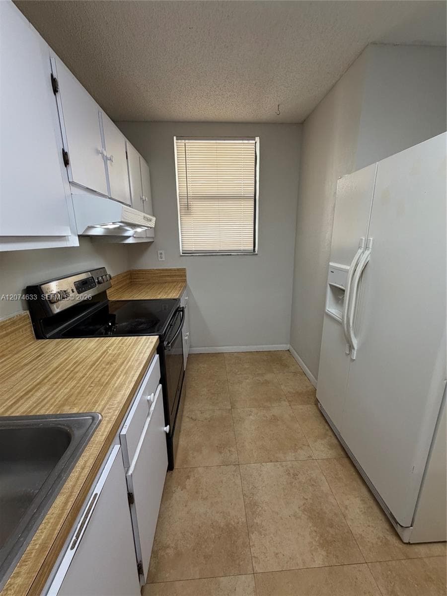 8429 Forest Hills Dr # 202, Coral Springs, FL 33065