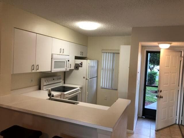 2236 N CYPRESS BEND Drive # 106, Pompano Beach, FL 33069 — zdjęcie 3