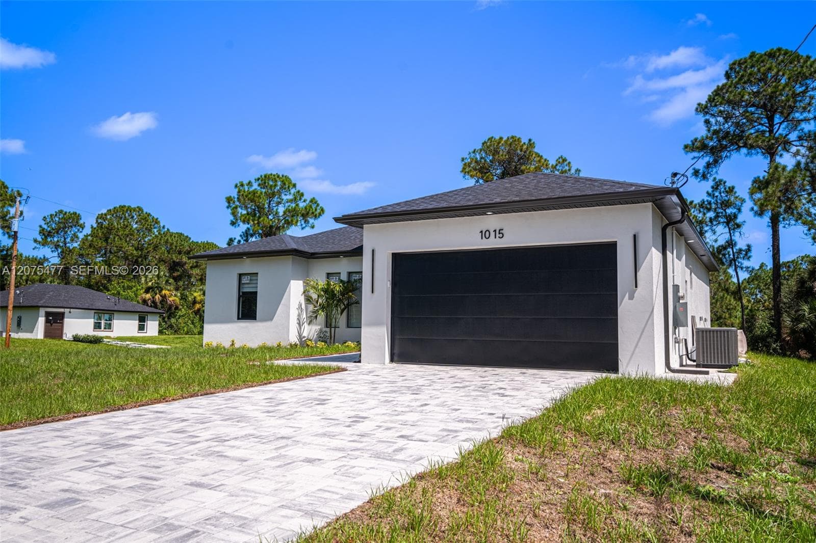 1015 E BAGGET ST, Lehigh Acres, FL 33974 — zdjęcie 5