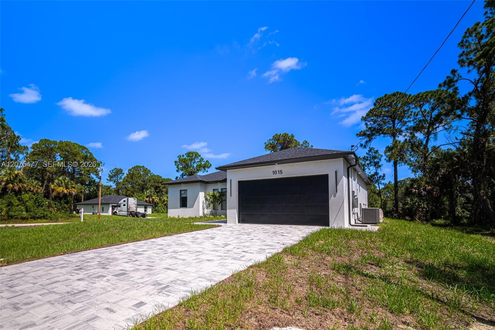 1015 E BAGGET ST, Lehigh Acres, FL 33974 — zdjęcie 4