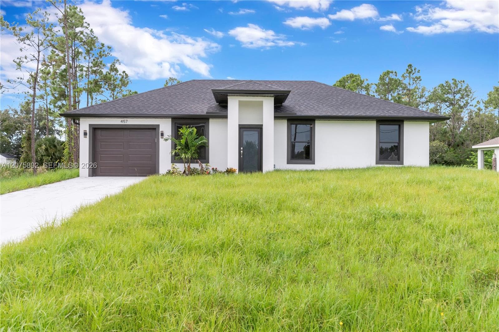 457 Woodman DR, Lehigh Acres, FL 33972 — zdjęcie 2