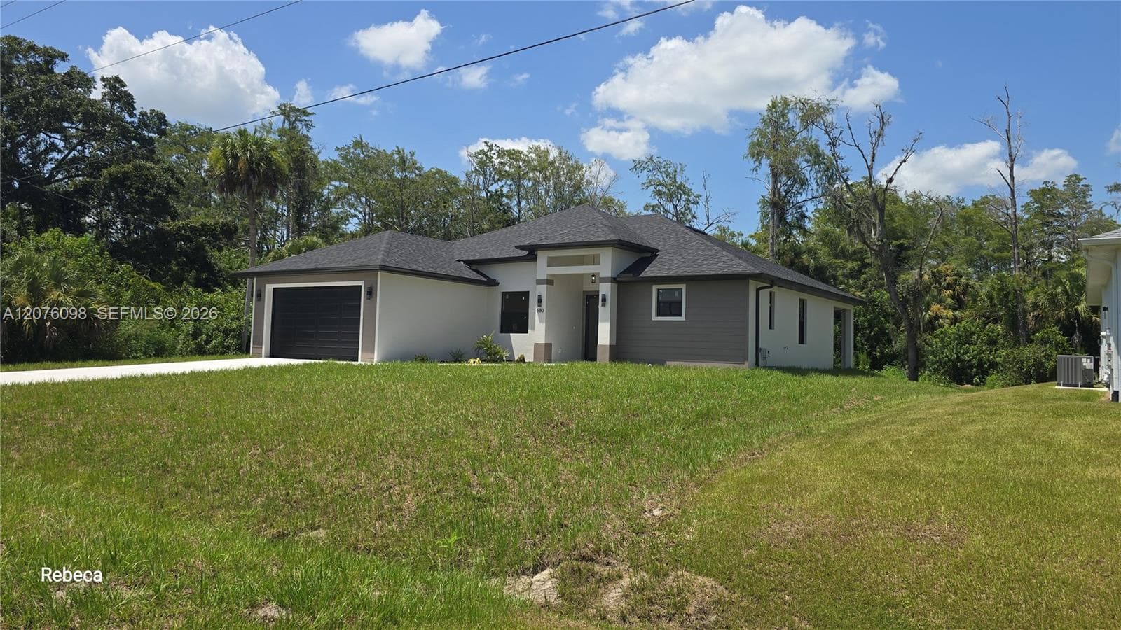 580 WOODVIEW DR, Lehigh Acres, FL 33972 — zdjęcie 2