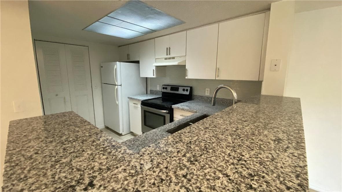 5045 WILES Road # 205, Coconut Creek, FL 33073