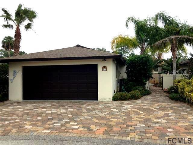 87 CLUB HOUSE DRIVE, PALM COAST, FL 32137