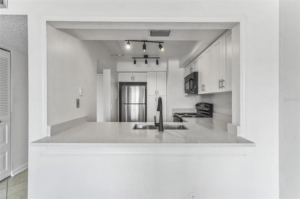 6219 PALMA DEL MAR BOULEVARD S # 301, ST PETERSBURG, FL 33715 — zdjęcie 4