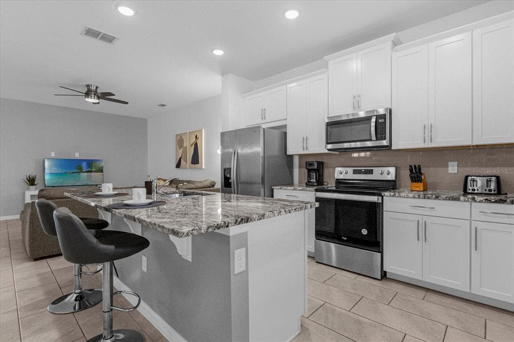 1644 TROPICAL PALMS CIRCLE, KISSIMMEE, FL 34747 — zdjęcie 3