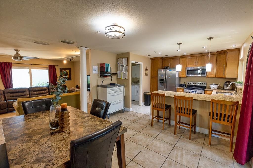 7128 WRENWOOD CIRCLE, TAMPA, FL 33617 — zdjęcie 2