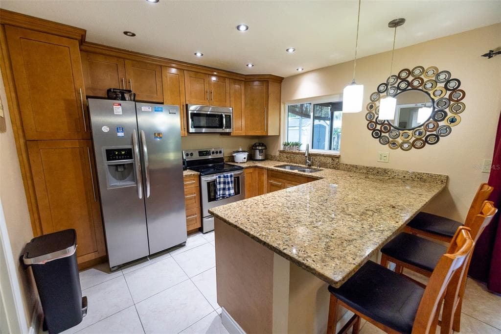 7128 WRENWOOD CIRCLE, TAMPA, FL 33617 — zdjęcie 3