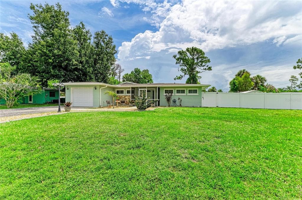 557 READING STREET NW, PORT CHARLOTTE, FL 33952