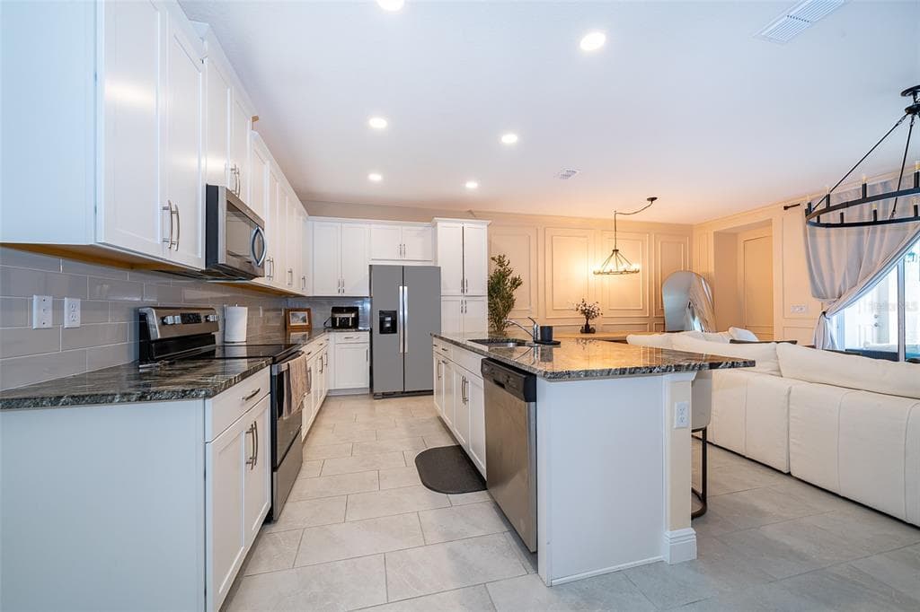 1660 TROPICAL PALMS CIRCLE, KISSIMMEE, FL 34747 — zdjęcie 4