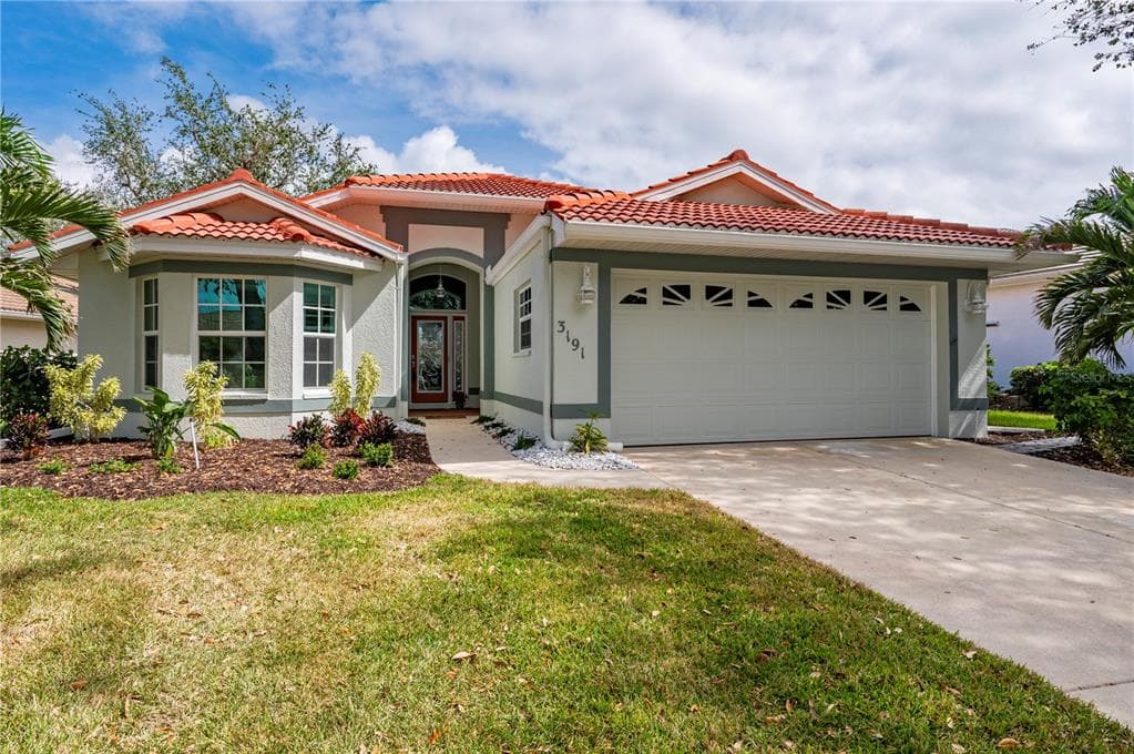 3191 VILLAGE LANE, PORT CHARLOTTE, FL 33953
