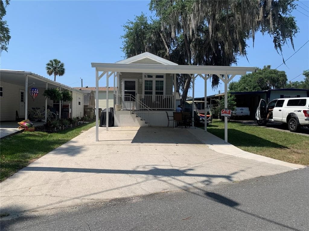 699 CINDI AVENUE, LEESBURG, FL 34788 — zdjęcie 2