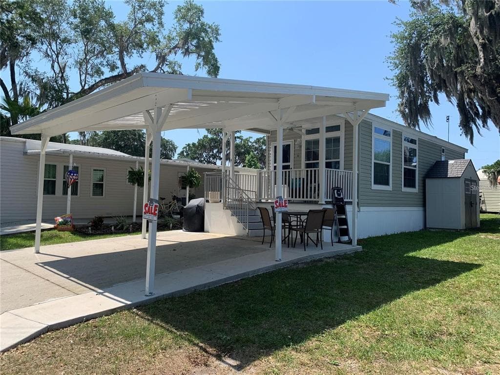 699 CINDI AVENUE, LEESBURG, FL 34788