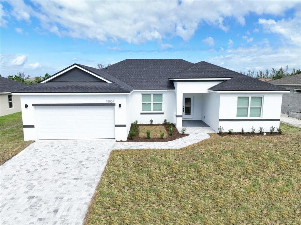 15504 GREENWOOD AVENUE, PORT CHARLOTTE, FL 33981