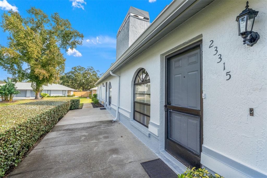 23315 CLUB VILLAS DRIVE, LAND O LAKES, FL 34639