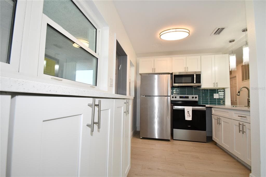 547 TRADE WINDS DRIVE, DUNEDIN, FL 34698 — zdjęcie 3