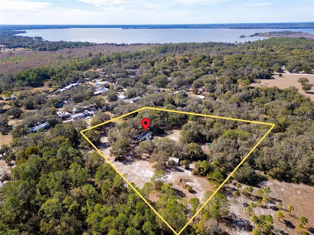 8725 TREASURE ISLAND ROAD, LEESBURG, FL 34788