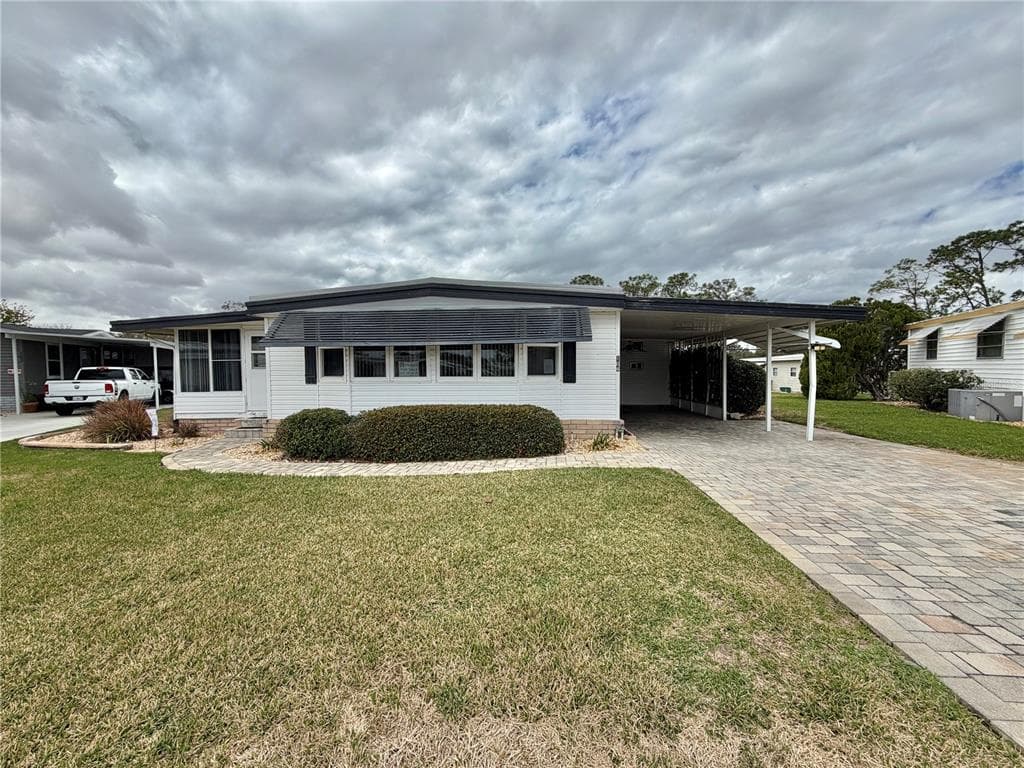 104 DOGWOOD TRAIL, LEESBURG, FL 34748