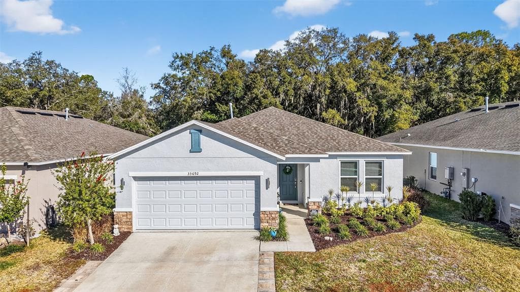 33692 SKY BLOSSOM CIRCLE, LEESBURG, FL 34788