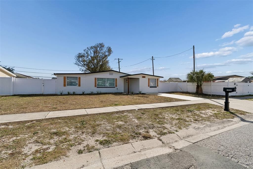 7910 W POWHATAN AVENUE, TAMPA, FL 33615 — zdjęcie 2