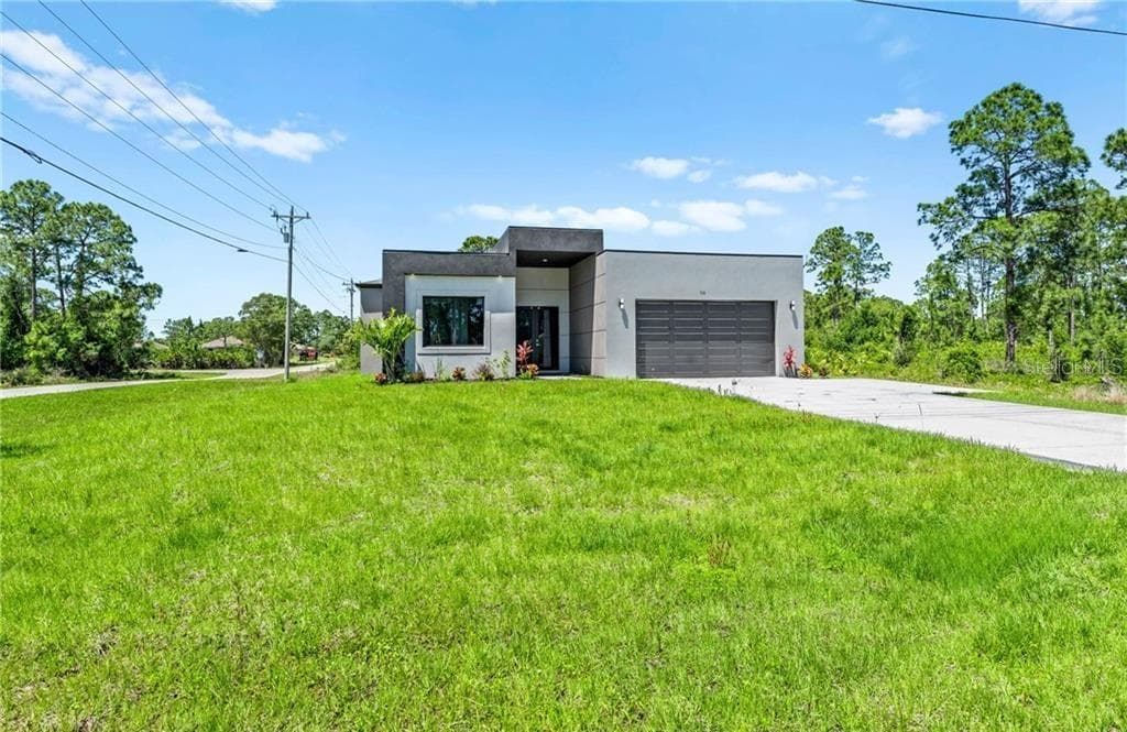 710 EISENHOWER BOULEVARD, LEHIGH ACRES, FL 33974 — zdjęcie 2