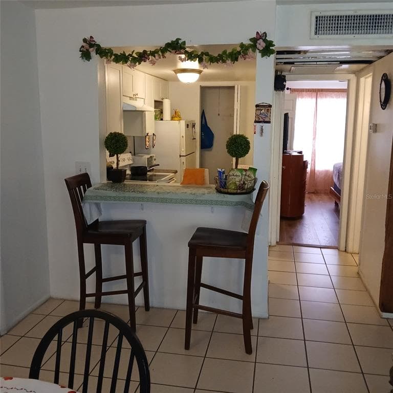 8609 N CHAMPLAIN COURT # 77, TAMPA, FL 33614 — zdjęcie 4