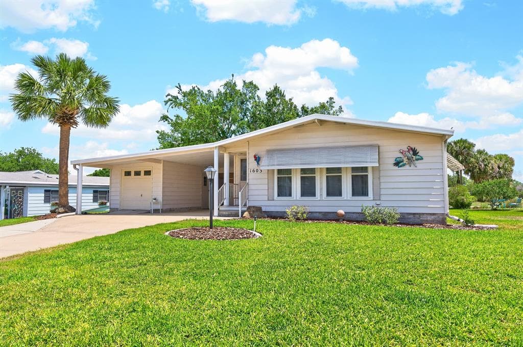 1603 COG HILL DRIVE, LADY LAKE, FL 32159