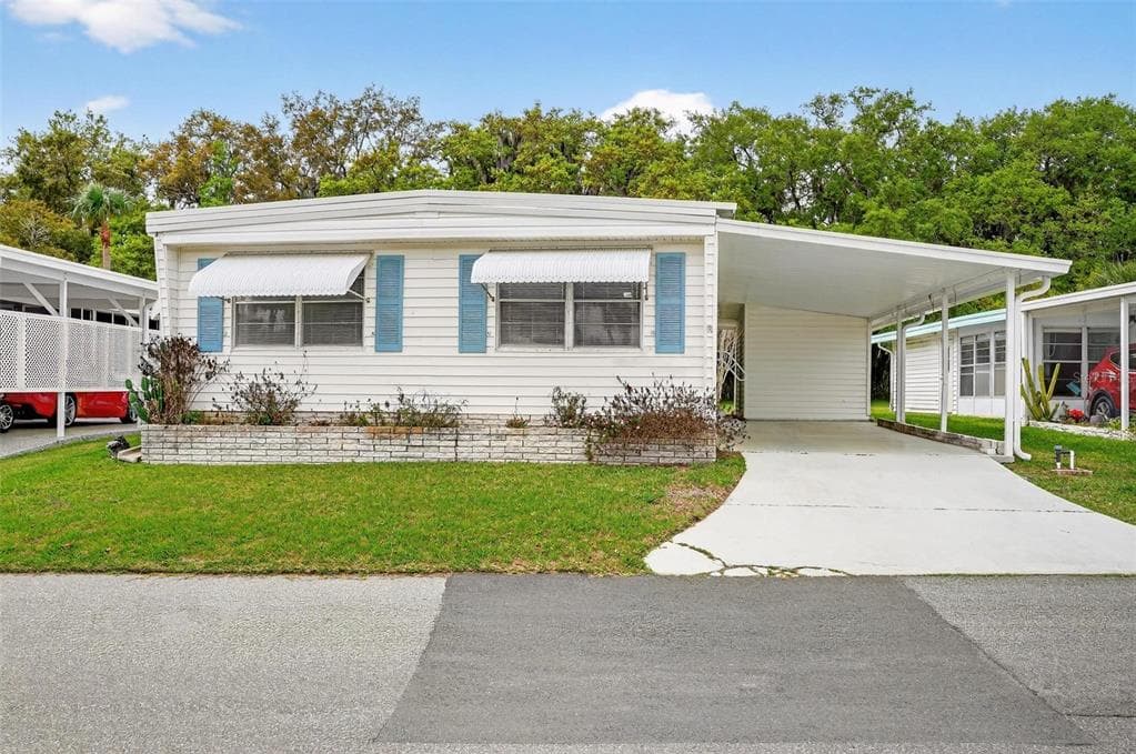 7 COCOS PLUMOSA DRIVE # A, EUSTIS, FL 32726