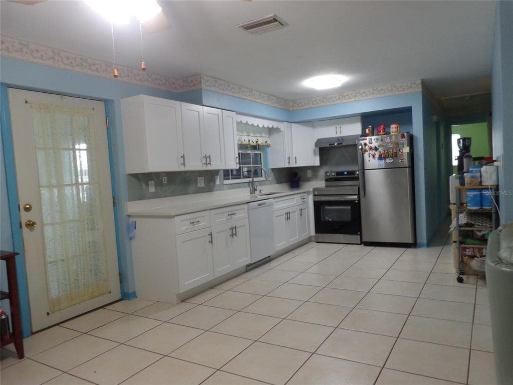 6165 26TH AVENUE N, ST PETERSBURG, FL 33710 — zdjęcie 4