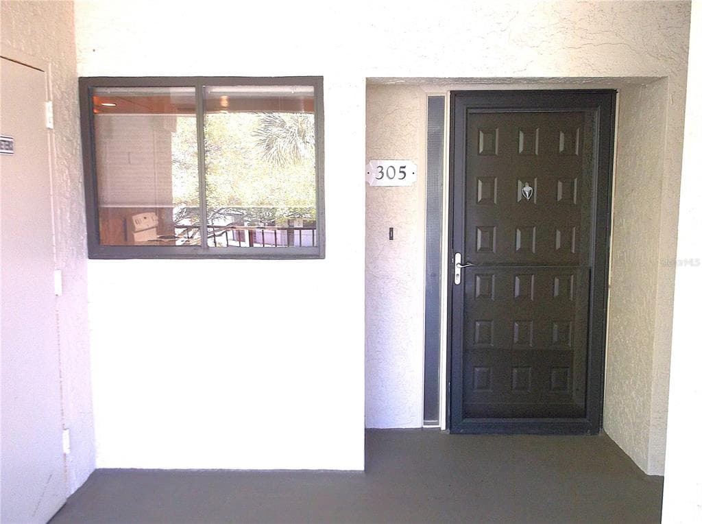 9433 HARBOR GREENS WAY # 305, SEMINOLE, FL 33776 — zdjęcie 2