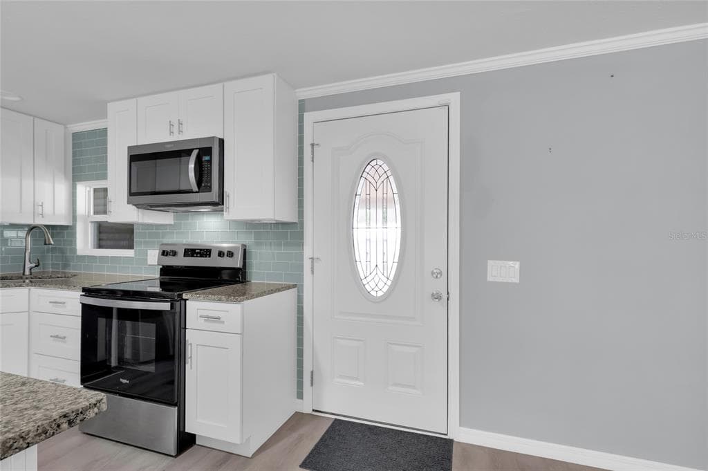 100 PAPAYA COVE, LEESBURG, FL 34748 — zdjęcie 3