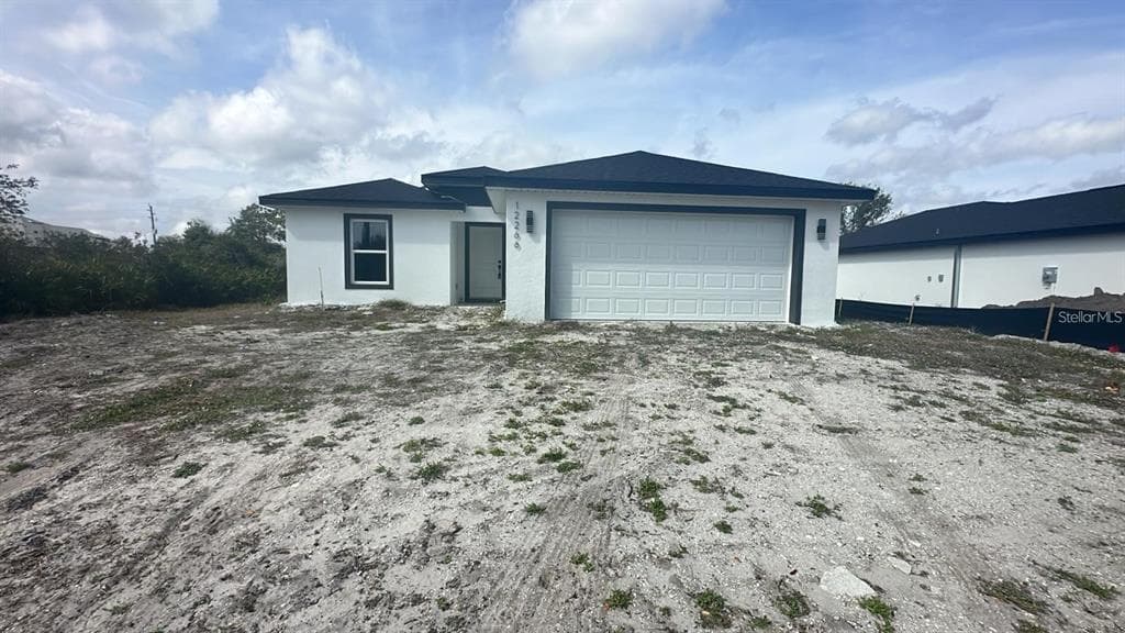 12266 EDWARDS ROAD, PORT CHARLOTTE, FL 33981