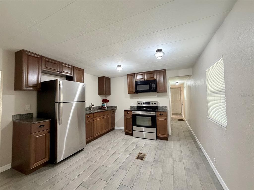 7037 LOFTY DRIVE, PORT RICHEY, FL 34668 — zdjęcie 5