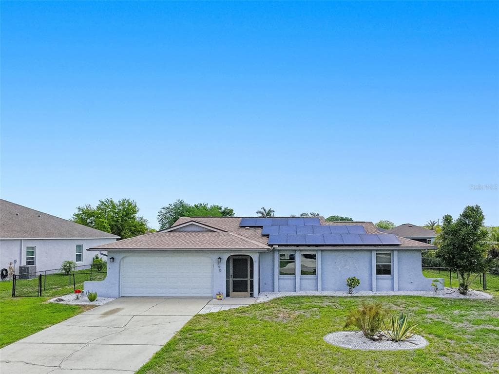 390 TRES LAGOAS STREET, PUNTA GORDA, FL 33983