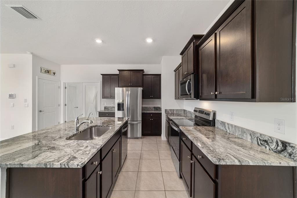 5051 STOKES WAY, WILDWOOD, FL 34785 — zdjęcie 4