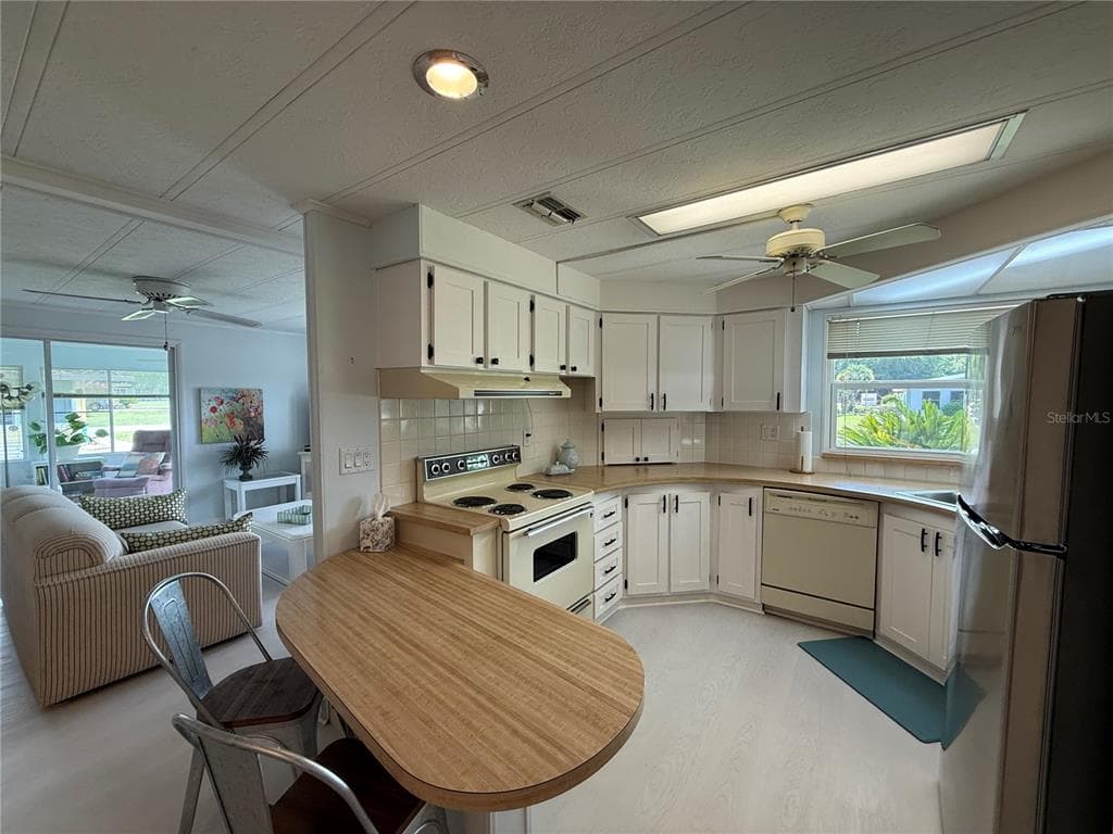11 N BOBWHITE ROAD, WILDWOOD, FL 34785 — zdjęcie 5